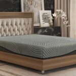 Stylish bedroom with tufted headboard, green accents, and luxurious details for modern comfort.