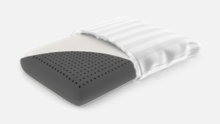Ergonomic pillow with cooling foam core and stylish striped cover for versatile sleep support.