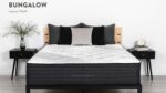 Modern bedroom with luxury plush Bungalow mattress and sleek bedside tables.
