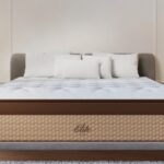 Luxurious Elite mattress in a stylish, modern bedroom with plush and elegant furnishings.