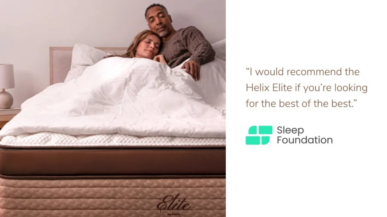 Cozy couple in bed enjoying restful sleep on Helix Elite mattress, endorsed by Sleep Foundation.