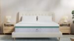 Modern bedroom with HELIX mattress, tufted headboard, and light wood nightstands.