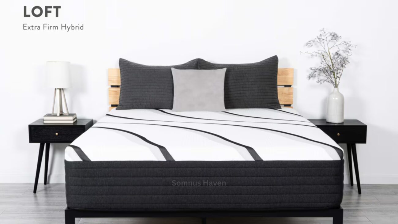 Modern bedroom with LOFT Extra Firm Hybrid mattress and sleek, monochromatic design elements.