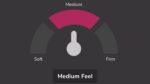 Gauge showing firmness levels—Soft, Medium (highlighted in pink), Firm; ideal for comfort products.
