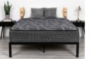 Modern bedroom with plush mattress, stylish decor, and serene ambiance.
