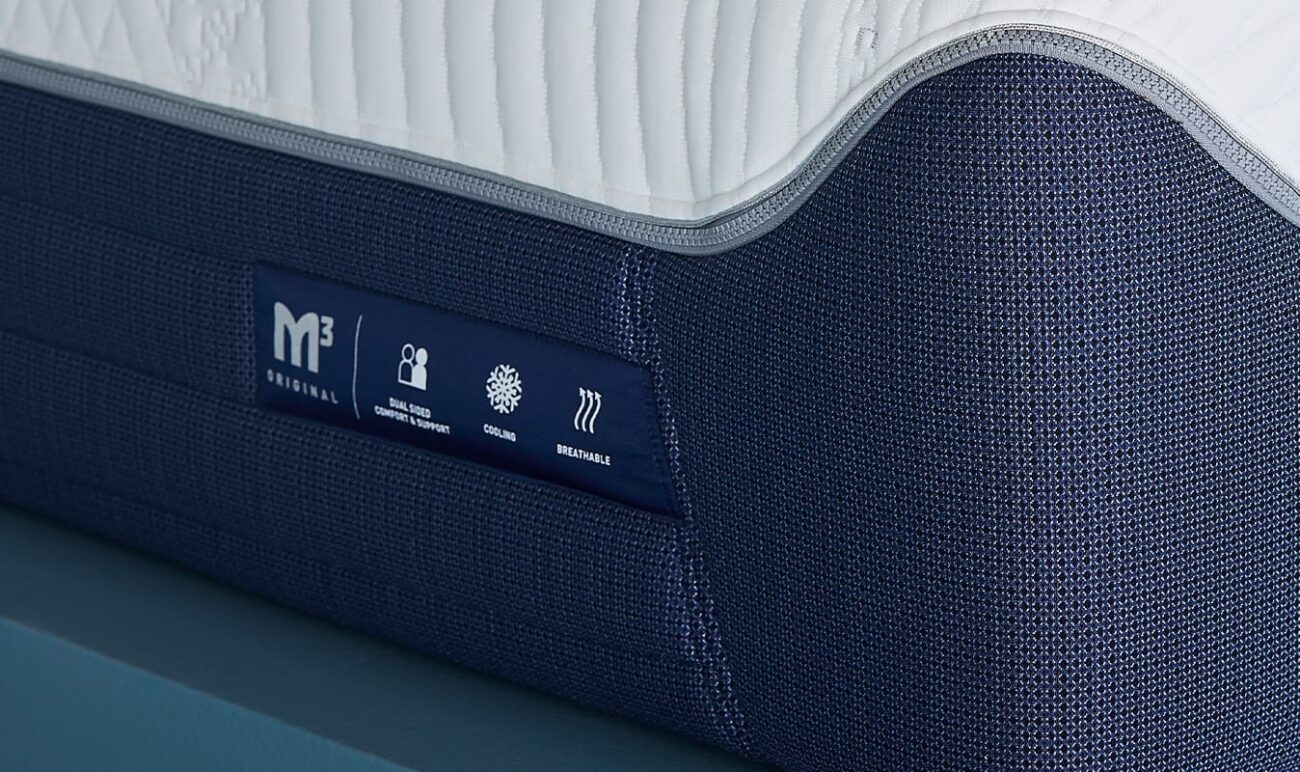 Close-up of M3 mattress with quilted top, cooling, and pressure relief features.