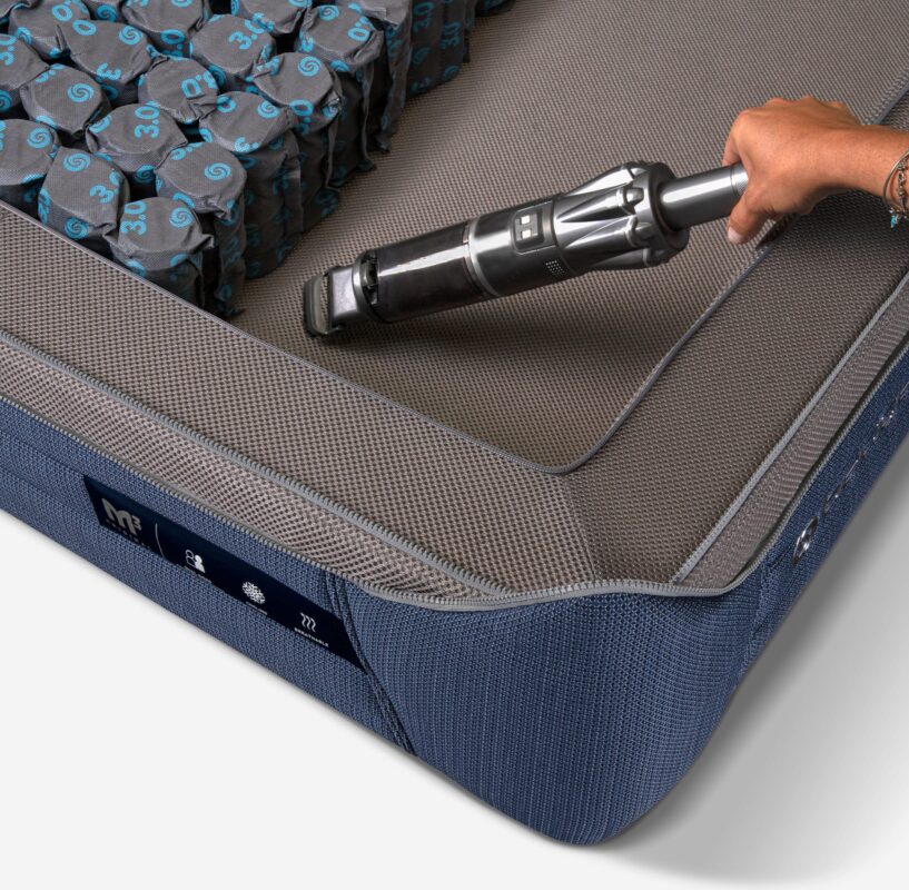 Modern mattress with breathable fabric, adjustable features, vacuum-maintained for comfort and durability.