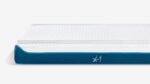 Modern X-1 Kids Mattress with breathable fabric and blue edge band for comfort and style.