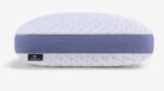 Modern oval pillow with textured comfort, lavender accents, and cooling mesh sides. Perfect for sleep.