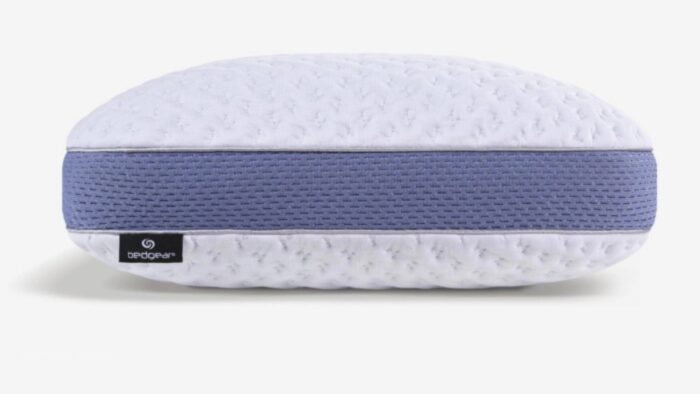 Modern oval pillow with textured comfort, lavender accents, and cooling mesh sides. Perfect for sleep.