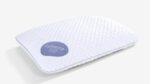 Modern ergonomic pillow with textured fabric, subtle geometric pattern, and 0.0 balance branding.