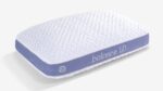 Ergonomic memory foam pillow with white textured design and blue balance 1.0 branding.