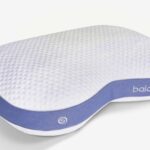 Ergonomic memory foam pillow with neck support, white and blue, branded balance.
