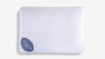 Modern white ergonomic pillow with textured surface and balance logo for restful sleep.