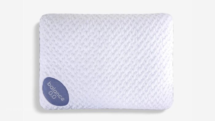 Modern white ergonomic pillow with textured surface and balance logo for restful sleep.