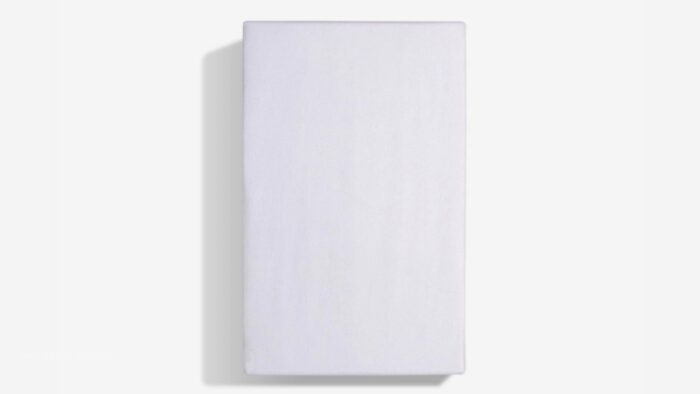 Minimalist blank canvas against white, emphasizing potential and creativity.