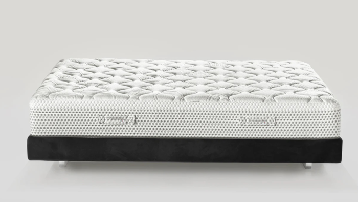 Modern sleek quilted mattress with breathable mesh, black sides, and four supportive feet.