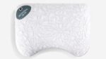 Ergonomic pillow with star pattern for neck support and spine alignment, stylish and comfortable.
