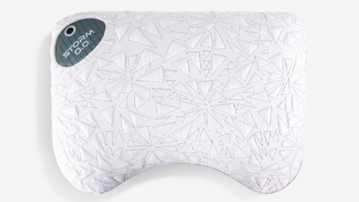 Ergonomic pillow with star pattern for neck support and spine alignment, stylish and comfortable.