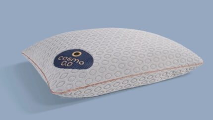 Stylish Cosmo pillow with modern design and comfort on a serene blue background.