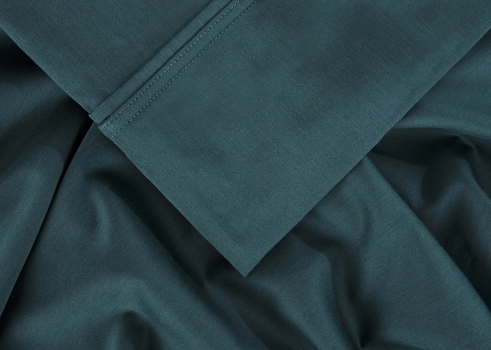 Dark teal fabric with soft texture, elegant sheen, and precise stitching for versatile use.