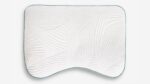 Ergonomic decorative pillow with wave pattern for lumbar support and modern style.