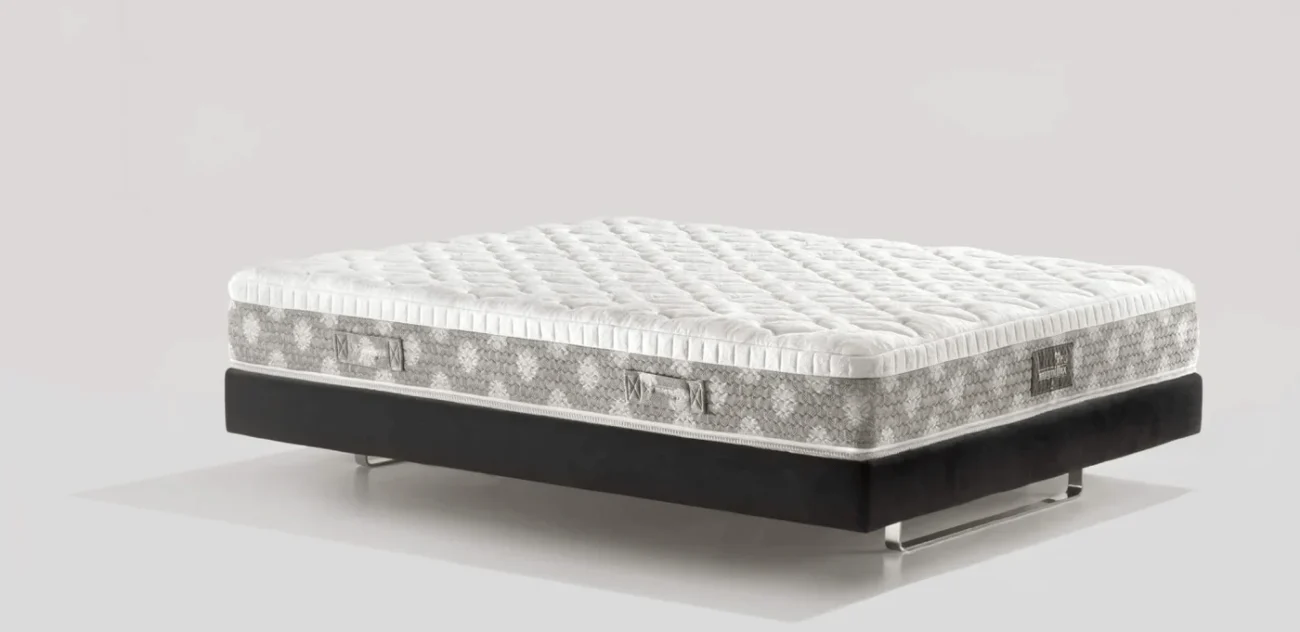 Luxurious modern mattress on a sleek dark foundation, perfect for stylish and functional bedrooms.