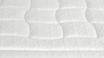 Plush white mattress with intricate quilting for luxurious bedroom decor and restful sleep.