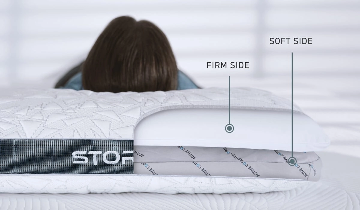 Dual-sided pillow with firm and soft sides for personalized comfort and adaptability.