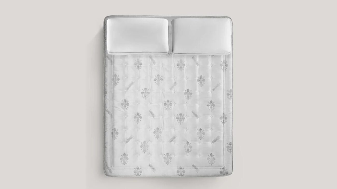 Luxurious tufted mattress with floral patterns, creating an inviting and serene bedroom atmosphere.
