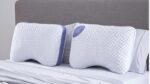 Ergonomic pillows with lavender accents enhance modern bedding style and optimal neck support.