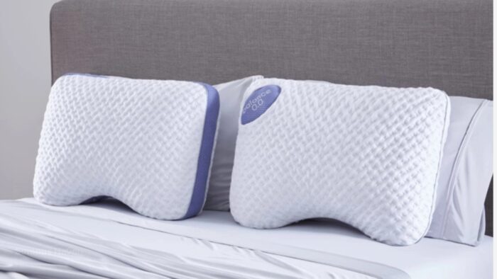 Ergonomic pillows with lavender accents enhance modern bedding style and optimal neck support.