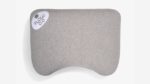 Ergonomic gray pillow, optimal support for head and neck, enhances sleep comfort.