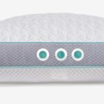 Modern ergonomic elongated pillow with dual-tone design, teal accents, and tactile fabric texture.