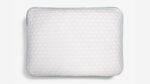Elegant white pillow with aqua trim, ergonomic support, and stylish design.