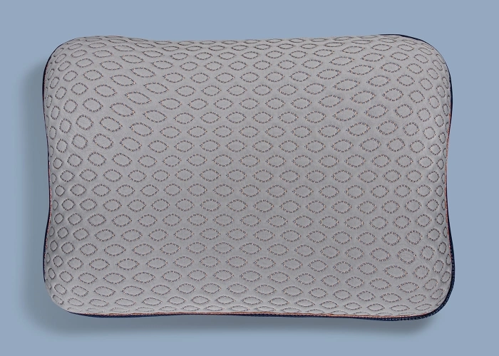 Modern gray pillow with oval pattern and dark trim on pale blue background.