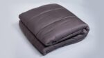 Charcoal gray quilted comforter, elegant design, plush warmth, versatile bedroom decor.
