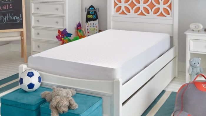 Bright kids room with stylish bed, orange accents, and playful decor.