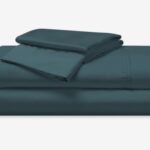 Luxurious deep teal bedding set for stylish, comfortable bedrooms.
