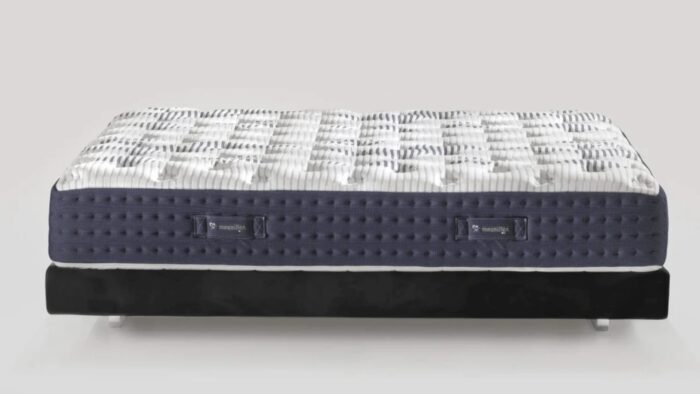 Modern gel mattress with breathable top and navy perforated sides for comfort and luxury.