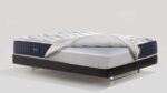Contemporary luxury mattress with quilted top, hybrid design, and breathable technology.