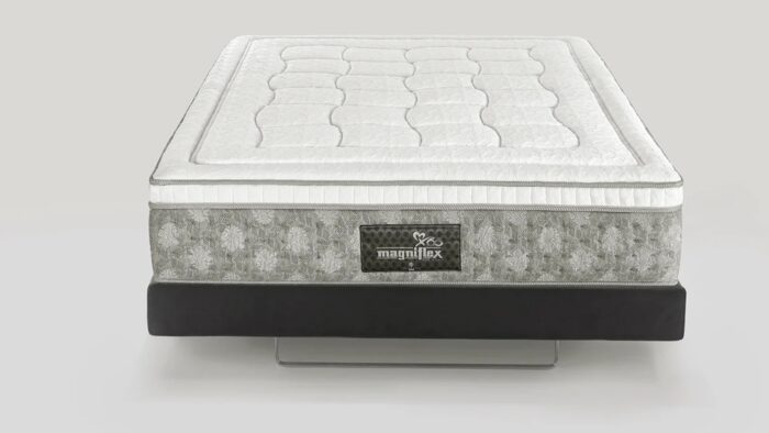 Elegant Magniflex mattress with quilted pattern, offering luxurious comfort and premium craftsmanship.