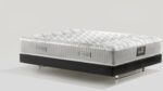 Luxurious quilted mattress with modern black box spring for ultimate comfort and style.