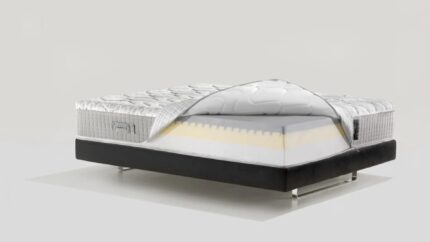 Modern mattress with plush quilted fabric on sleek platform bed for ultimate comfort.
