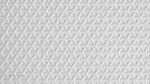 Intricate white textured surface with abstract knot patterns for decor or textiles.