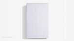Minimalist white panel with glossy finish and soft lighting for serene design.