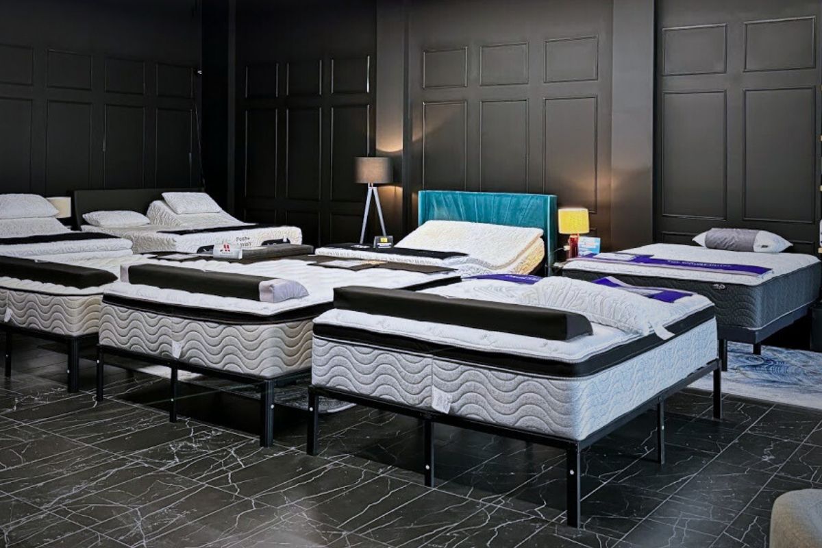 Modern mattress showroom with elegant decor, adjustable features, and inviting ambiance.