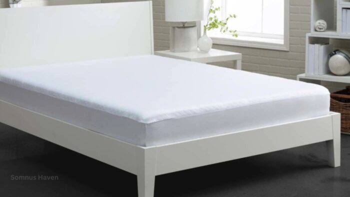 Minimalist white bedroom featuring sleek bed, modern lamp, natural light, and organized decor.