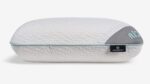 Modern ergonomic pillow with plush gray cover, aqua accents, and supportive design for better sleep.