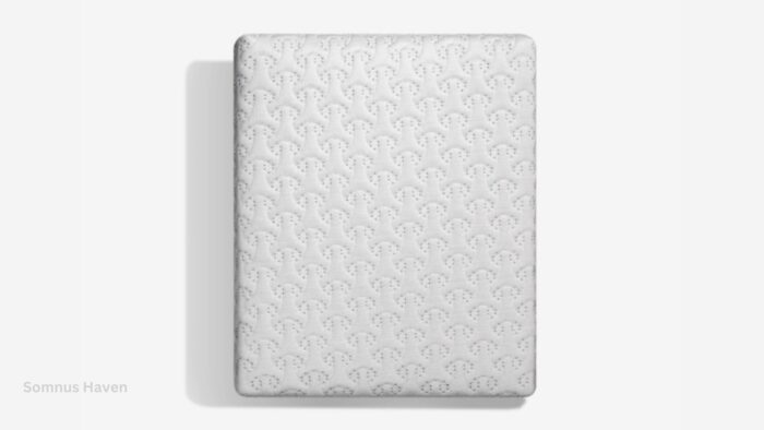 Sleek minimalist mattress with interwoven pattern against white background for modern bedroom design.